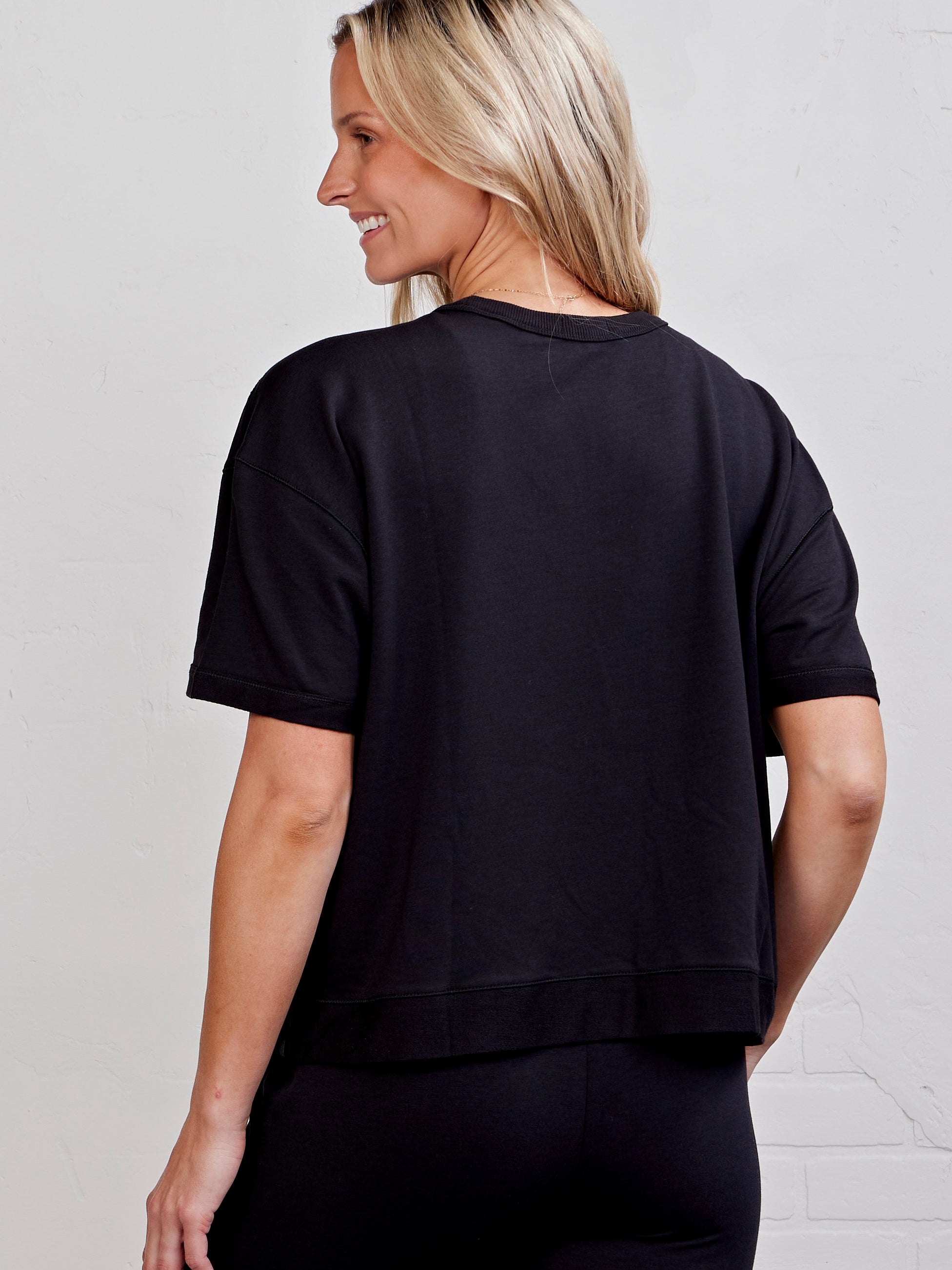 Varsity Boxy Short Sleeve Sweatshirt - tasc Performance (Black)