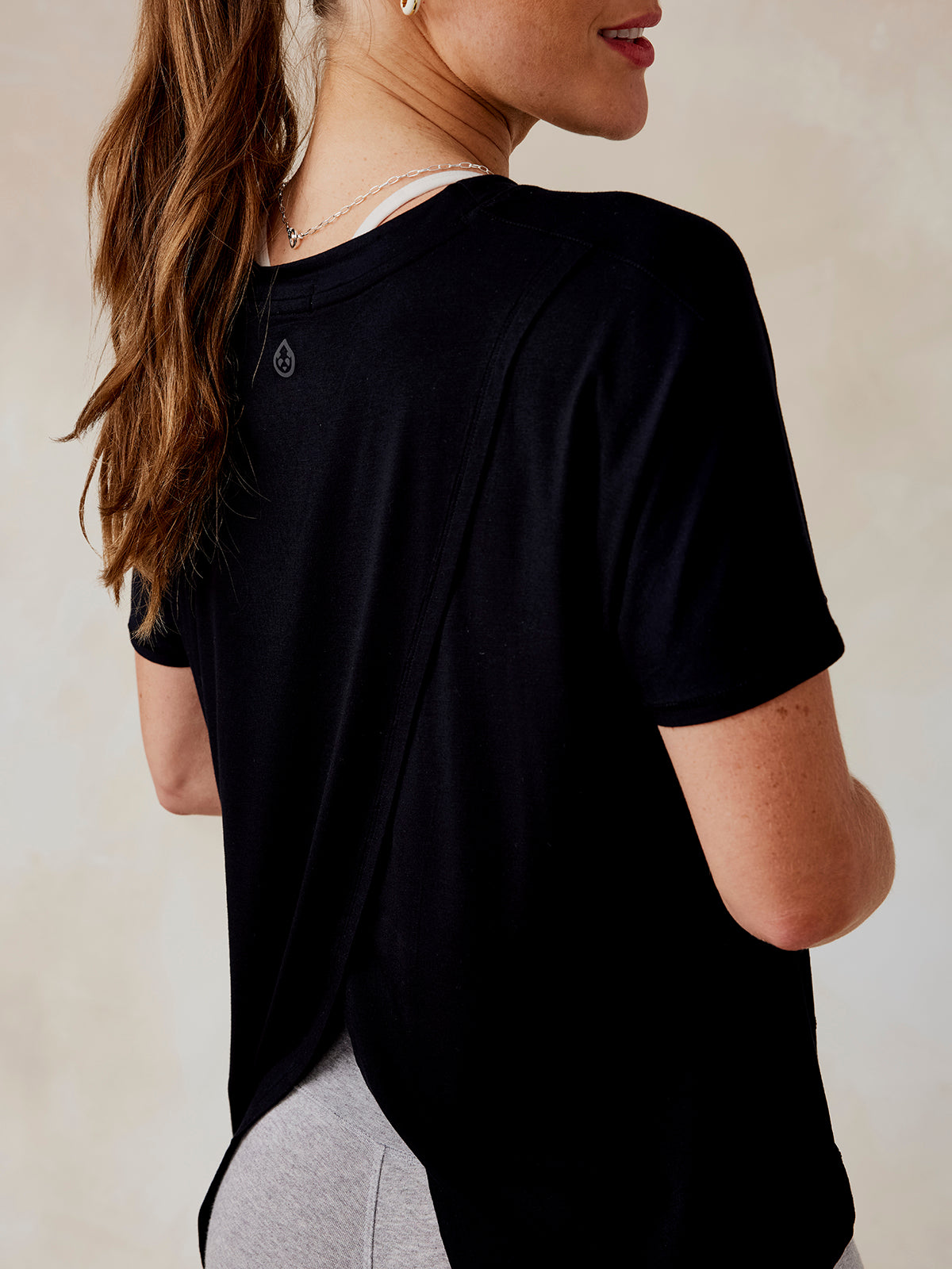 Uptown Luxe Cross Back T-Shirt- tasc Performance (Black)